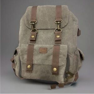 Roots Brown Canvas Backpack with Brass Accents